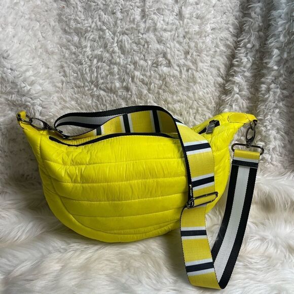 Think Rolyn Half moon puffer yellow reversible strap crossbody bag. - Picture 1 of 16